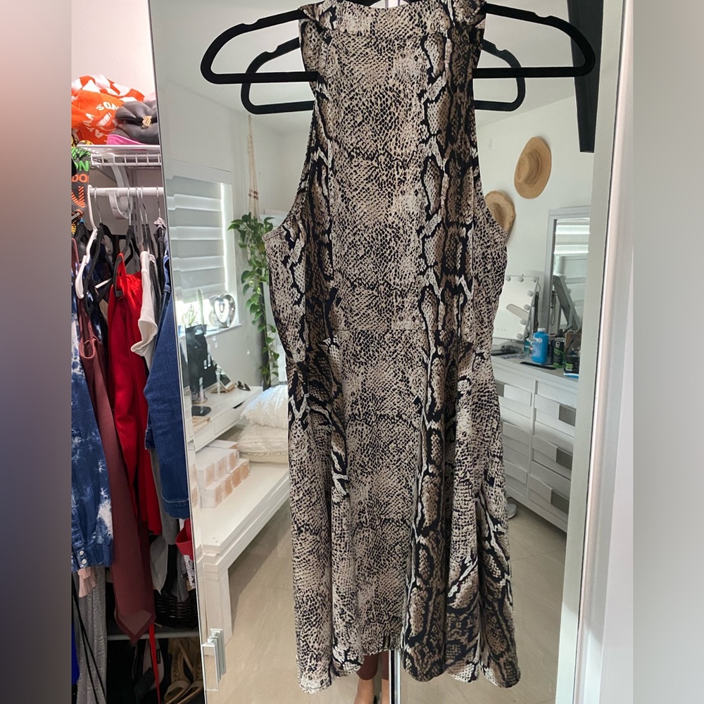 Animal print. Black and brown  dress